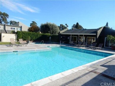 Large community pool and adjacent spa