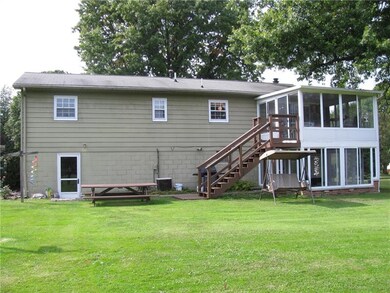 REAR ENCLOSED PORCHES MAKES ENTERTAINING A BREEZE.