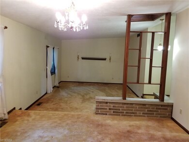 View through dining room into living room, updated