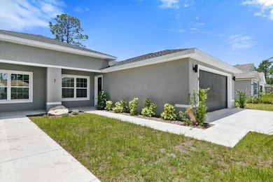 7 Regis Ln unit B, Palm Coast, FL 32164 - photo 2