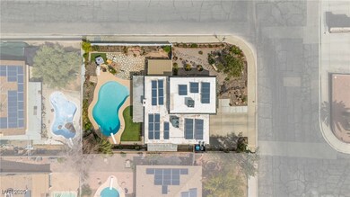 Birds eye view of property.  Corner lot with a spa