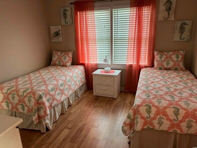 Bedroom with light wood-type flooring