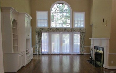 This is the great room with a gas log fireplace, b