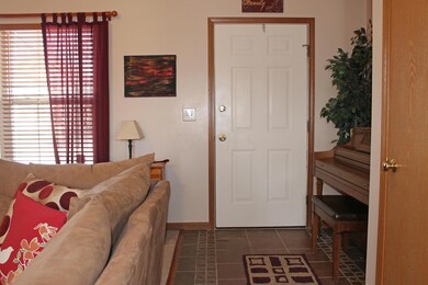 Foyer with ceramic tile flooring