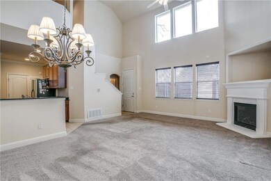 Open living/dining area with view into the kitchen