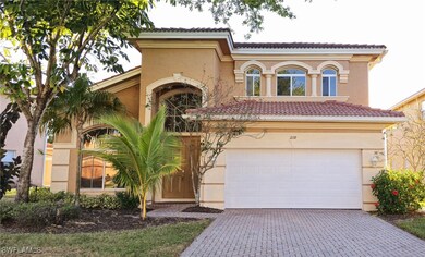 Mediterranean / spanish-style house featuring a ti