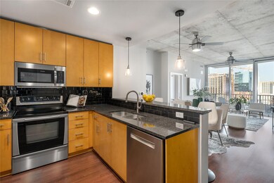 Kitchen featuring stainless steel appliances, a p