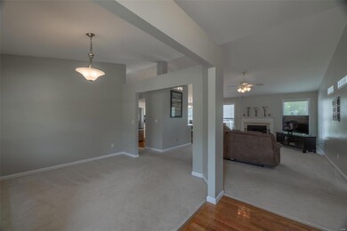 Enter the home to a space for a formal dining room