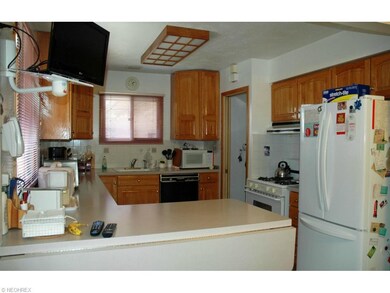 Kitchen with Newer Cabinets & Counter, Vinyl Flooring and all Appliances Stay