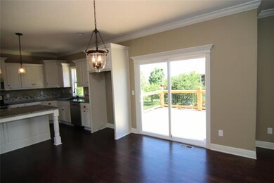 1709 Knoll Creek Ln, Raymore, MO 64083 - photo 7