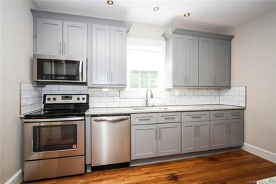 Kitchen offers tons of countertop space for prep a