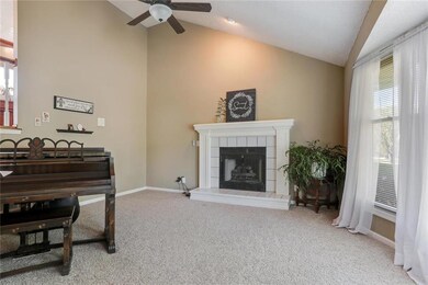 Enter into the large living room with vaulted ceil