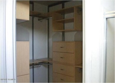 Classy Closets shelving in master closet