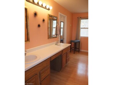 Large master bath with double sink vanity.