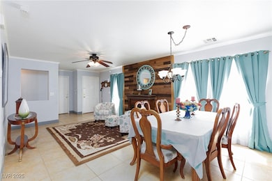 Dining space featuring light tile patterned floori