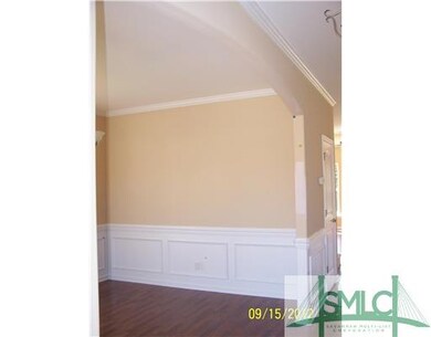 Dining Room. Notice the arched opening and trim wo