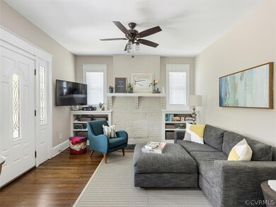 Bricked in fireplace with flanking built ins, ceil