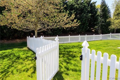 Newer Picket Fence encloses tree-lined back yard!