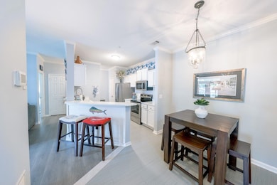 View from Foyer Looking at Kitchen & Din
