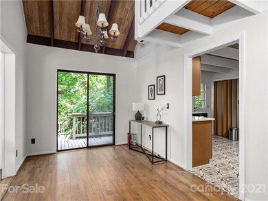 Kitchen on the right. Doors to the deck.