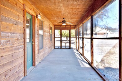 Screen porch offers cool afternoon breeze.