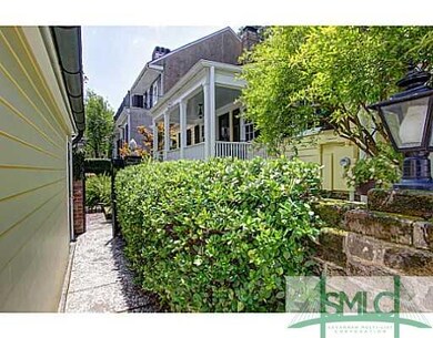 Exterior Front. Side Garden Entrance