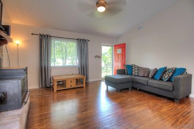 Great room with cathedral ceiling, large front win