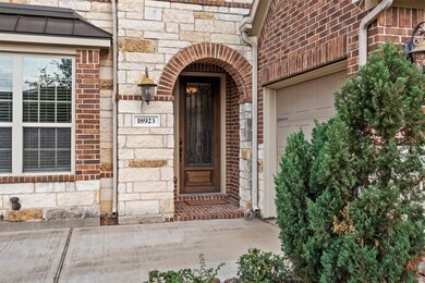 The elegant brick and stone elevation makes quite a first impression.