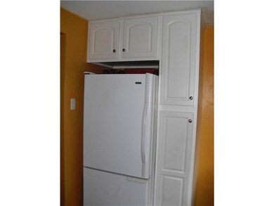 Kitchen. Refrigerator and pantry.