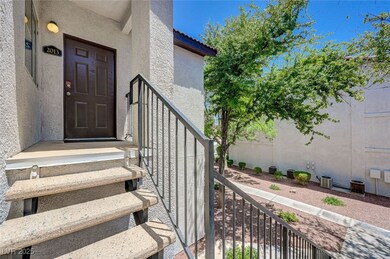 Property entrance with stucco siding and central A