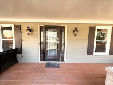 Property entrance with a porch