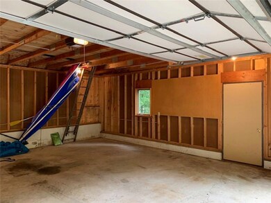 A view inside of the garage... with more storage area up above!