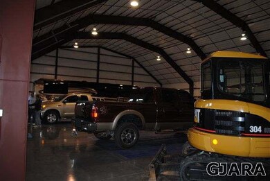 could fit lots of cars, toys, farm equipment, boat