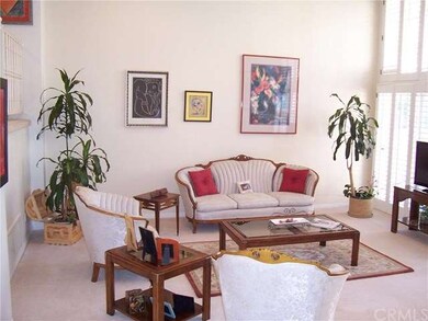 Living room has floor to ceiling windows with plan