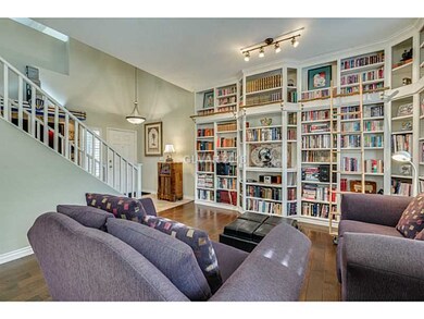 Living Room. Custom library bookcases w/ ladder.