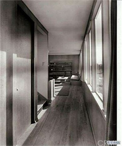 Original photo of front entry (photography by Juli