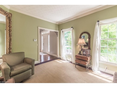 Formal Living Room with beautiful moldings.