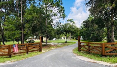 Fenced entry to 7889 N Neige Point