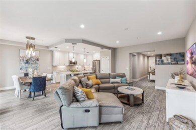 Living room featuring light hardwood / wood-style 