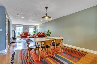 A view of the dining & living space from the kitch