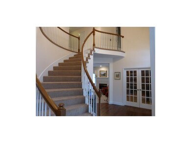 Stunning statement curved staircase.