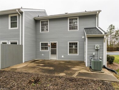 Nice end unit with large patio and green space on side and back of home.