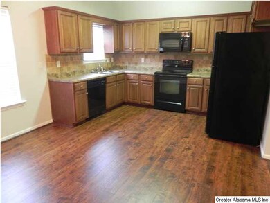 Large kitchen with new tile backsplash!