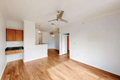 Unfurnished living room featuring visible vents, o