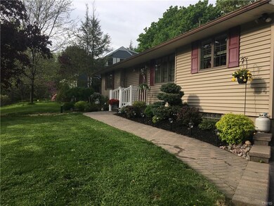 Beautifully landscaped including paved walkway