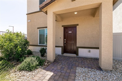 Property entrance featuring porch/overhang