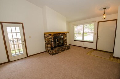 Living Room w/fireplace, New Carpet and freshly pa