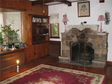 Living Room. stone fireplace, wood, new bay window