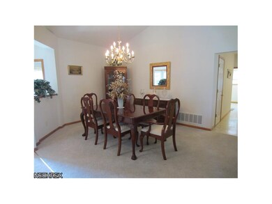Formal Dining Room with Vaulted Ceilings