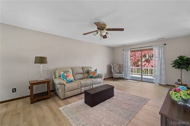 Spacious light filled Living room with new LVP flo